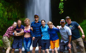 Group in Front of Waterfall in Chile