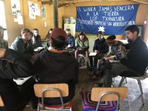 Chile students meet Mapuche spokes person.
